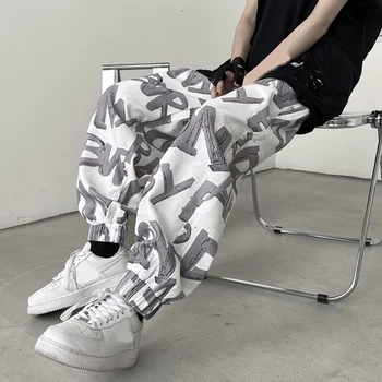 Korejski hlače s буквенным po cijeloj površini Хикигава Ženske Hip-hop Trkači Харадзюку Slobodne ravne ženske sportske hlače s visokim elastičan struk Punk-hlače